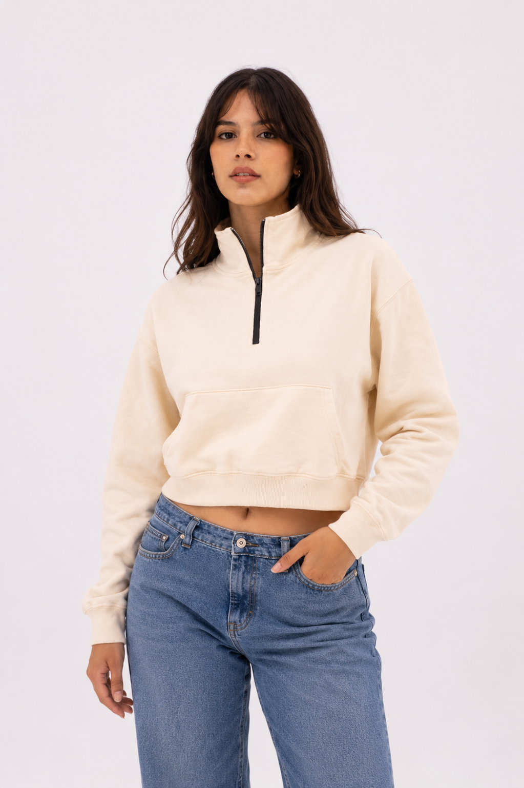 Front view of the Beige Crop Zipper displaying the mock neck, quarter-zip closure, kangaroo pocket, and clean minimalist construction.
