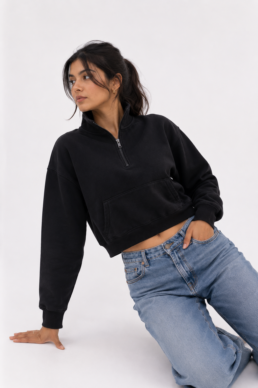 Front view of the Black Crop Zipper highlighting the quarter-zip mock neck, kangaroo pocket, and premium heavyweight fleece construction.