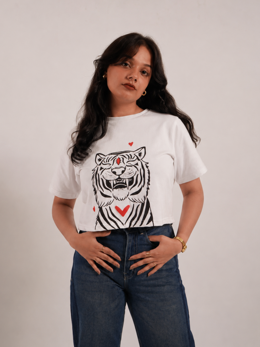 Female model wearing Fierce & Fluffy white tiger graphic crop top