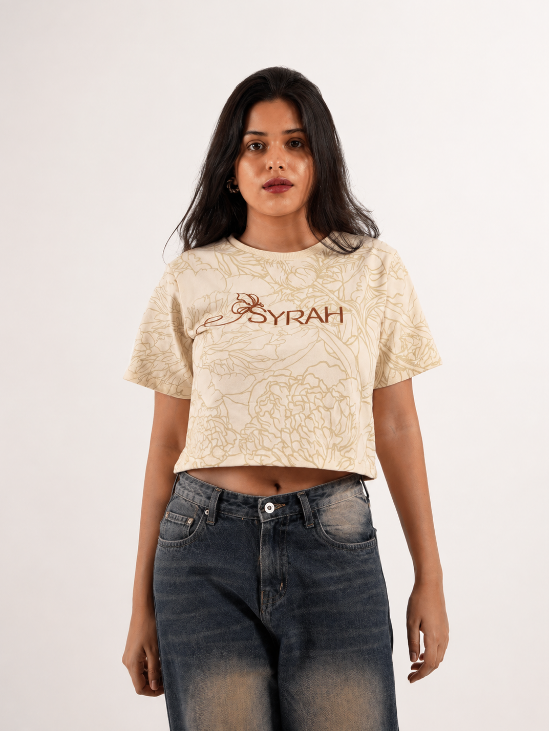 Front view of Golden Bloom premium cream floral crop top by SYRAH