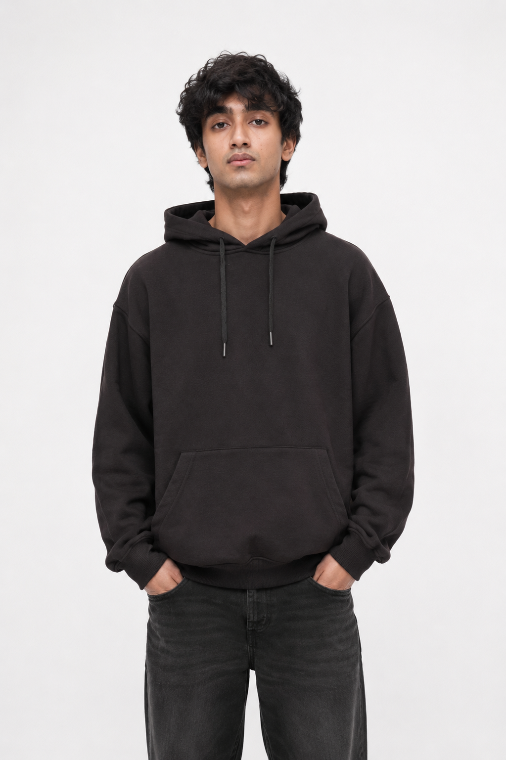 Front view of Midnight Lavender oversized black hoodie worn by a male model.