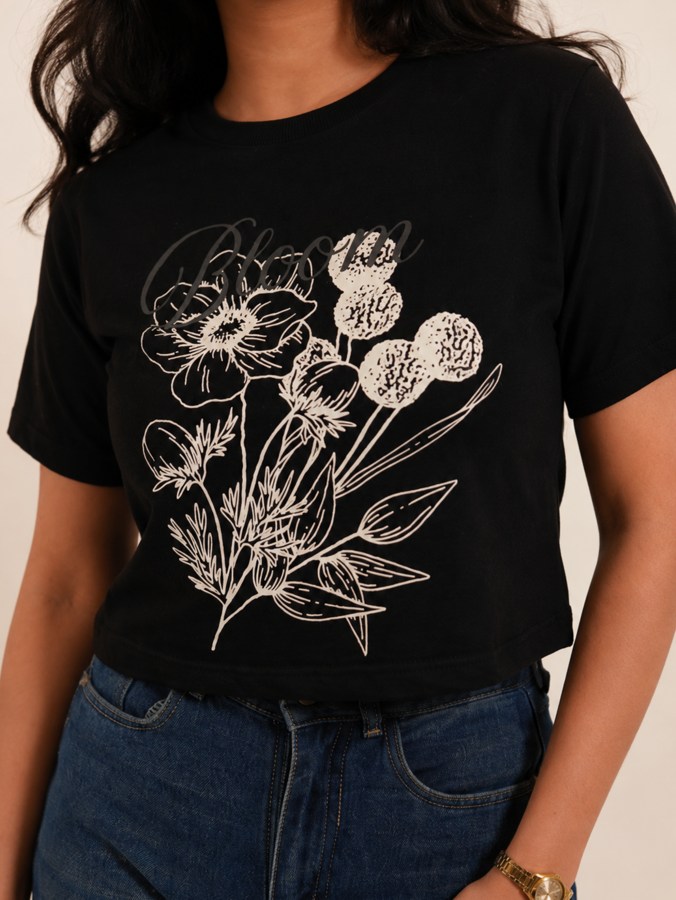 Close-up of Noir Bloom crop top highlighting botanical artwork and premium cotton fabric