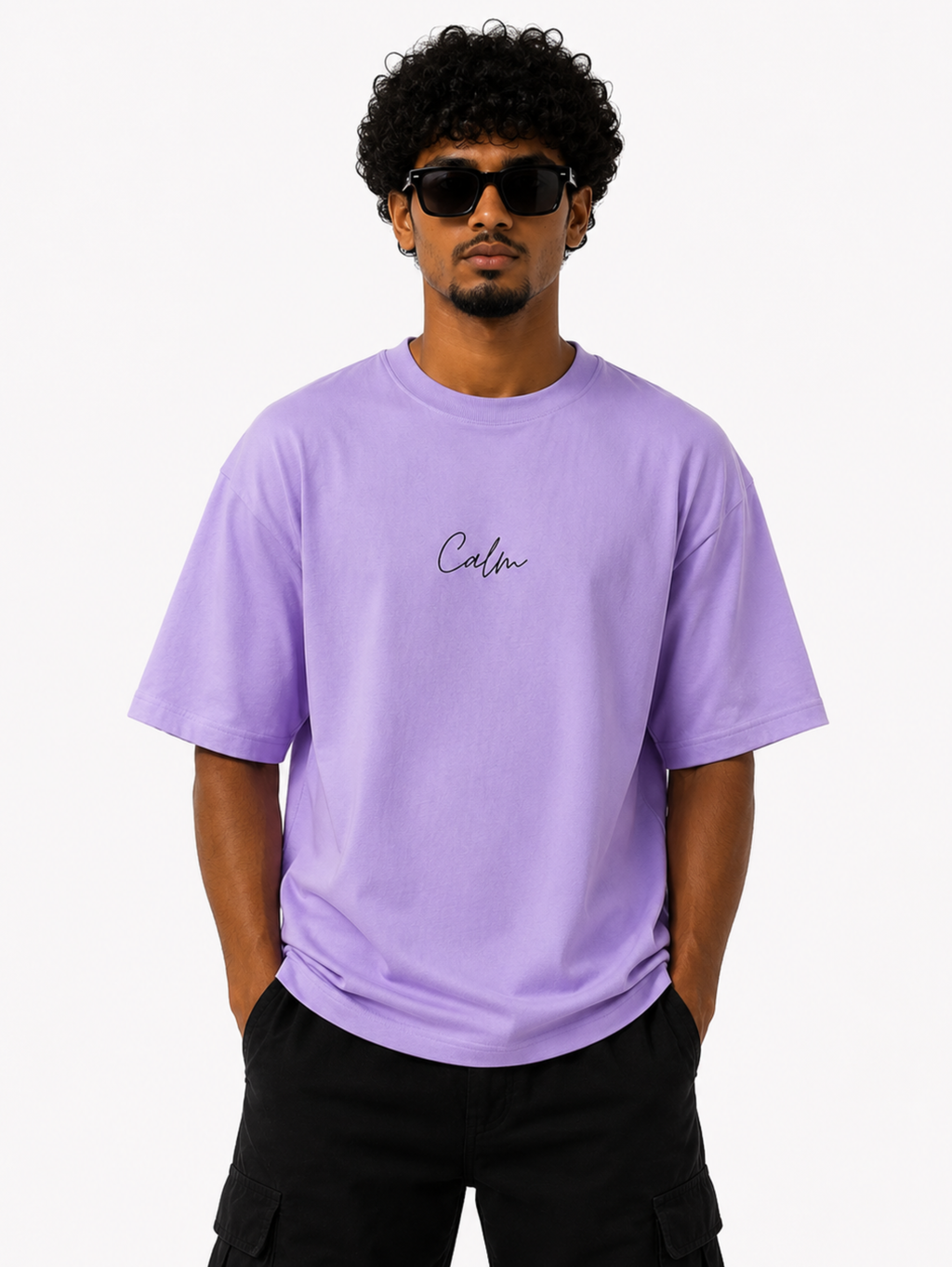 Male model wearing Still Bloom oversized lavender heavyweight cotton t-shirt with minimalist streetwear styling