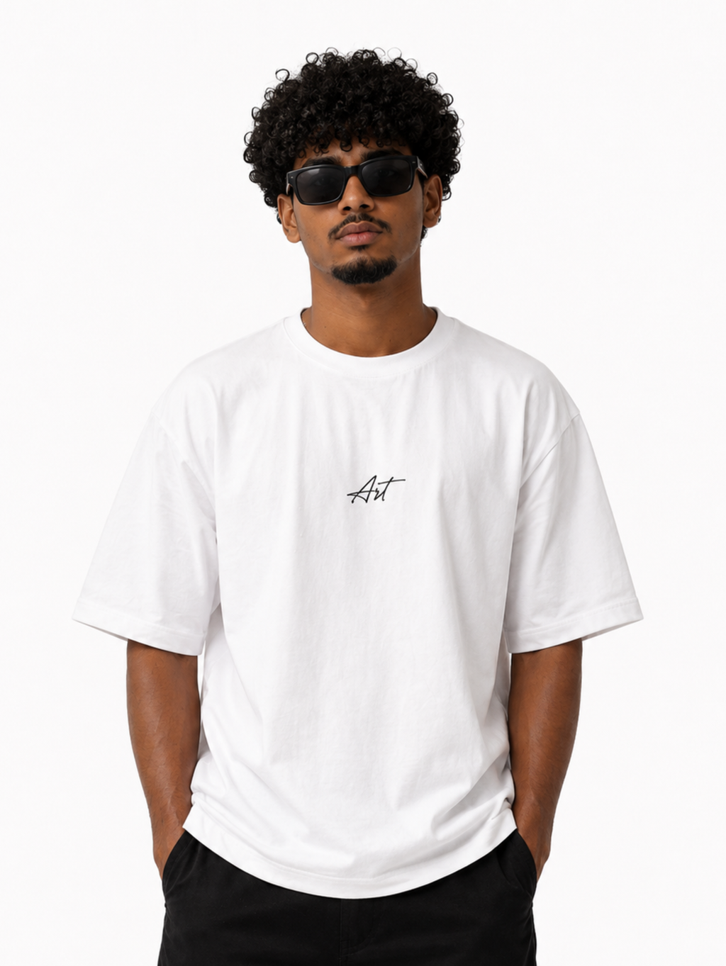 Male model wearing Undying Canvas oversized heavyweight white streetwear t-shirt with minimalist front graphic