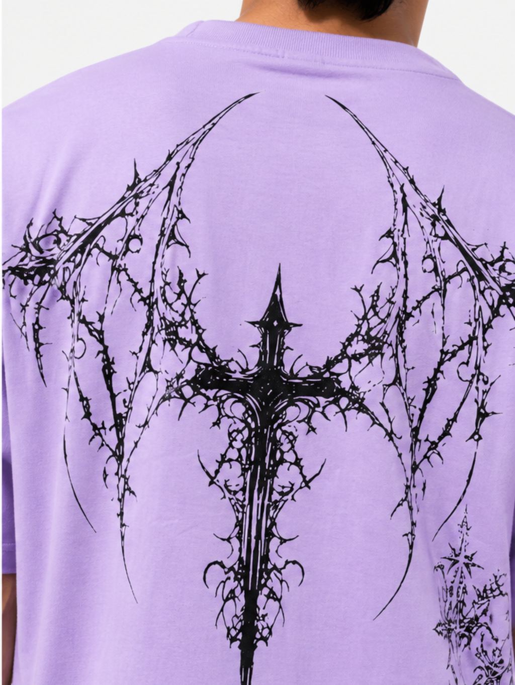 Back view of Thorned Oath oversized lavender t-shirt with large gothic wing graphic